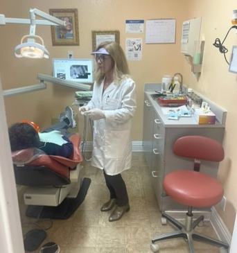 Dr. Emami treating a patient at Sunland Dental Care